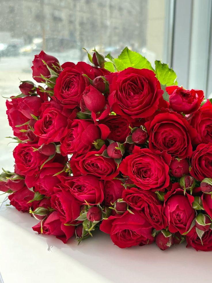 Professional floral arrangement in modern corporate setting